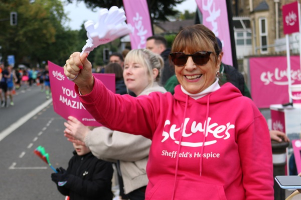 St Luke's Event Volunteer cheering on runners